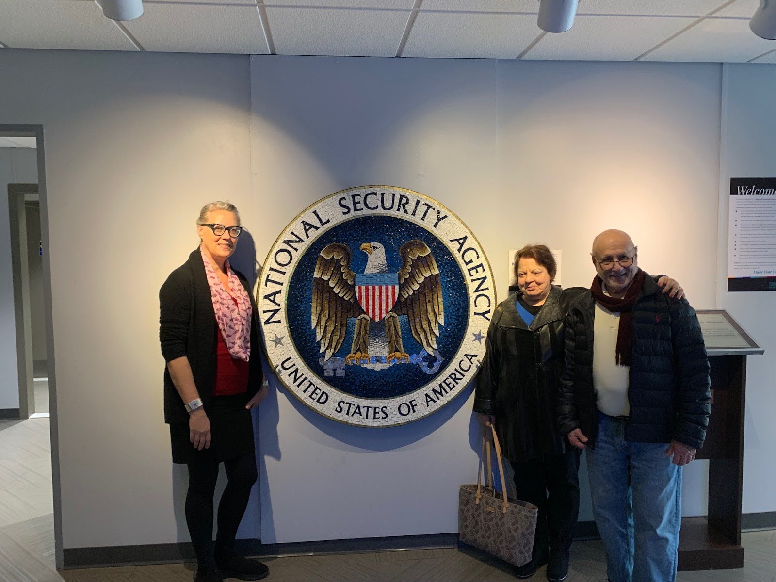 people standing around National Security Agency Seal