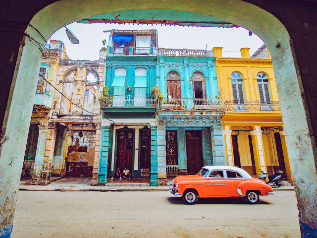 Street scene in Havana with antique car