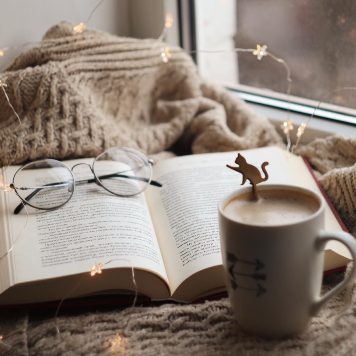 Cozy scene with a book and a coffee
