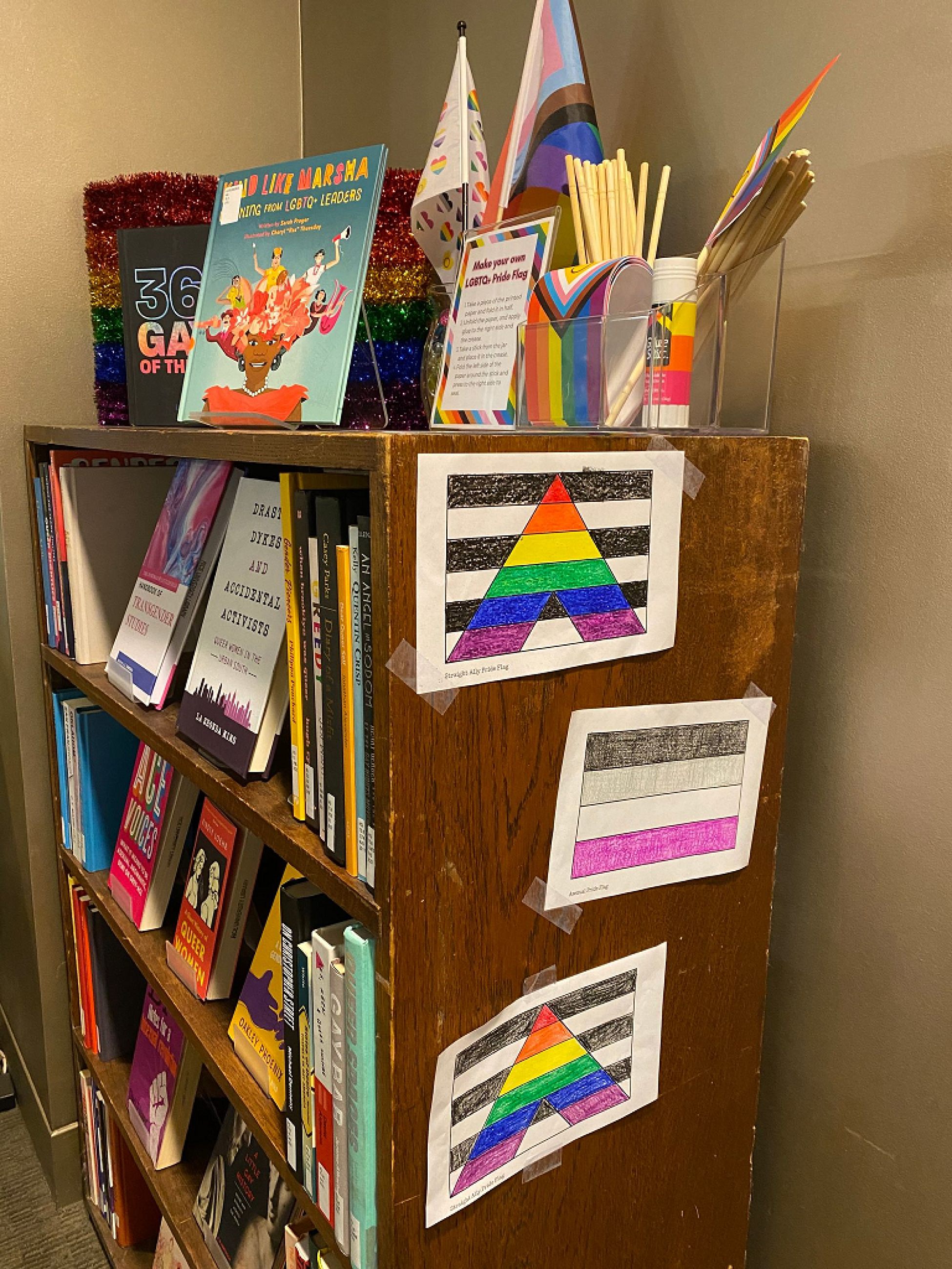 LGBTQ+ Pride display with flags