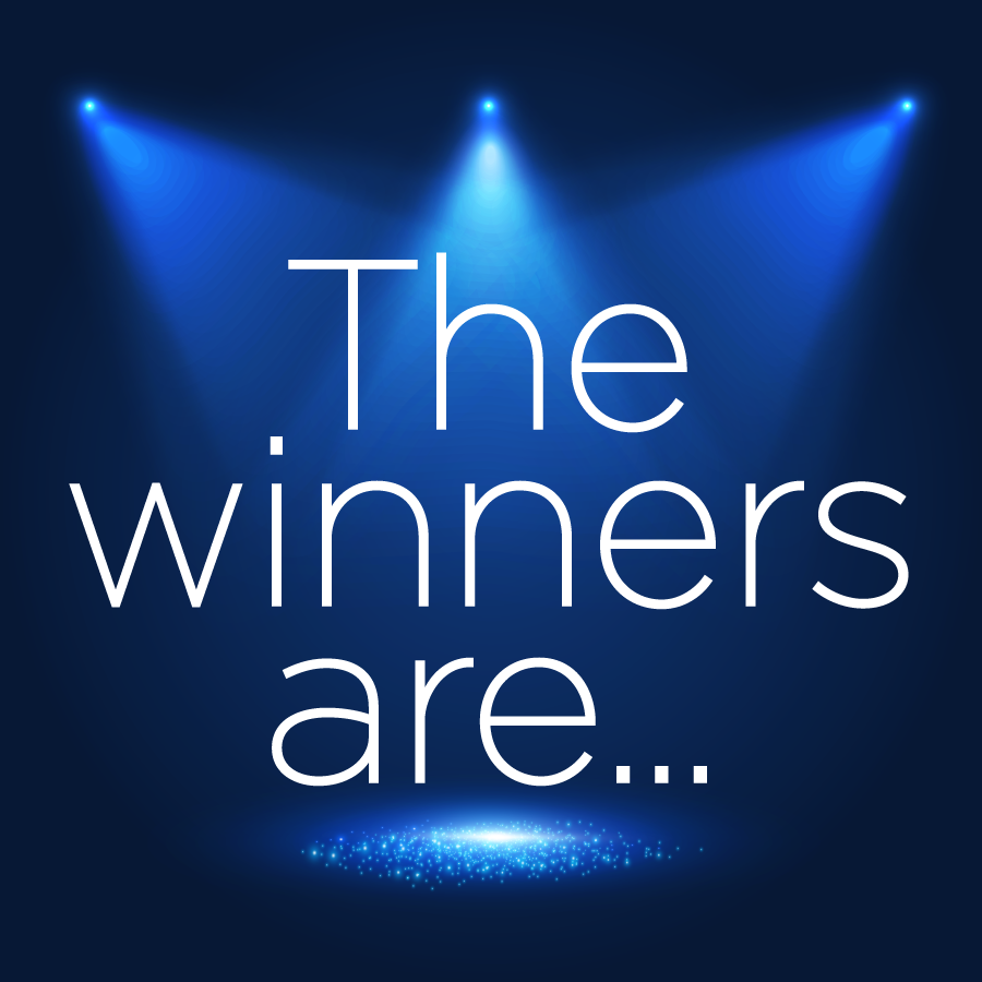 creative writing excellence exemplars Spotlights on a stage with the words, "The winners are..."